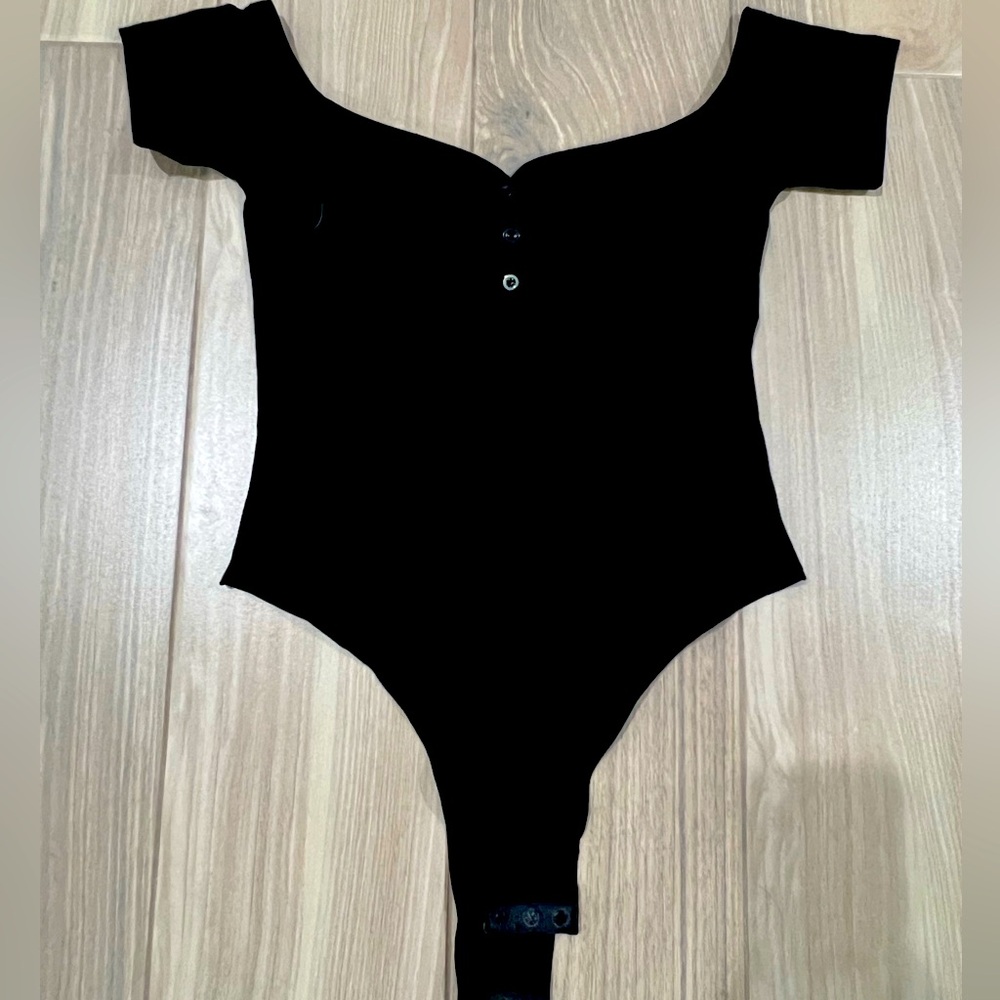 Black brand new bodysuit.